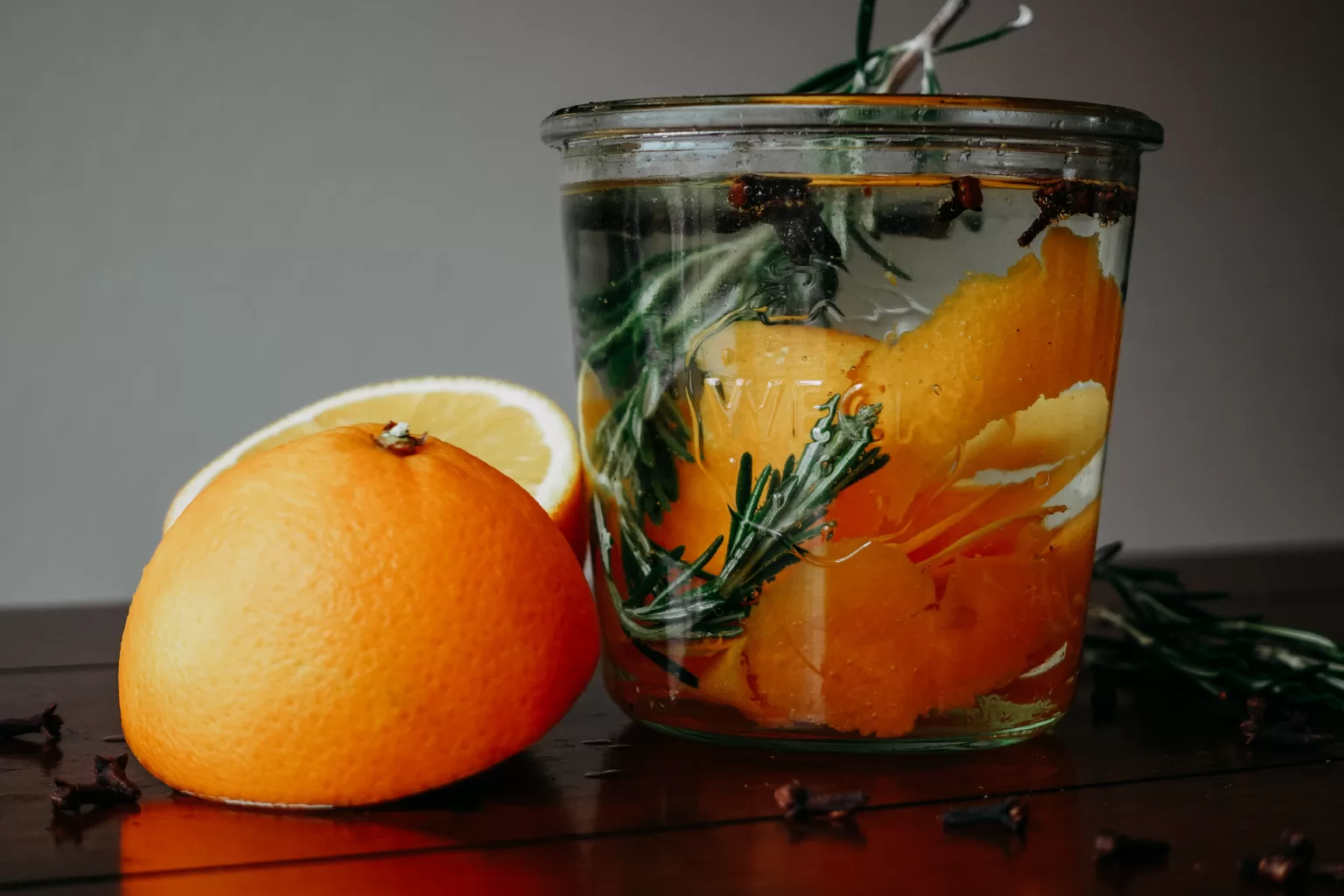 weck jar with orange rosemary and cloves