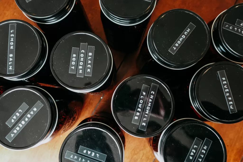 amber jars with black lids