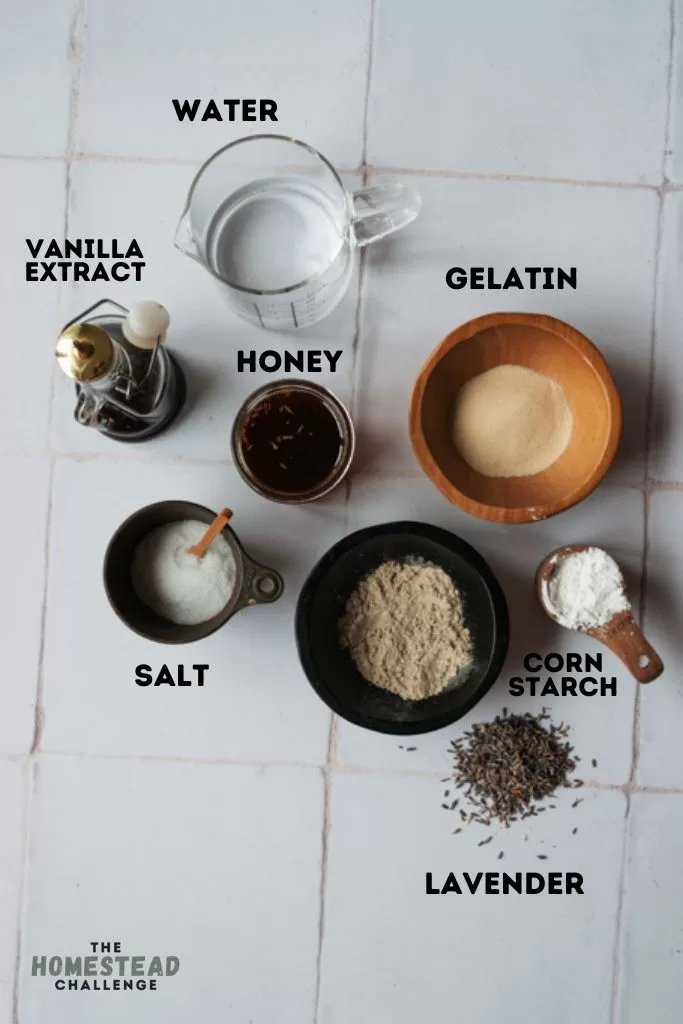marshmallow ingredients laid out on white tile photographed from above